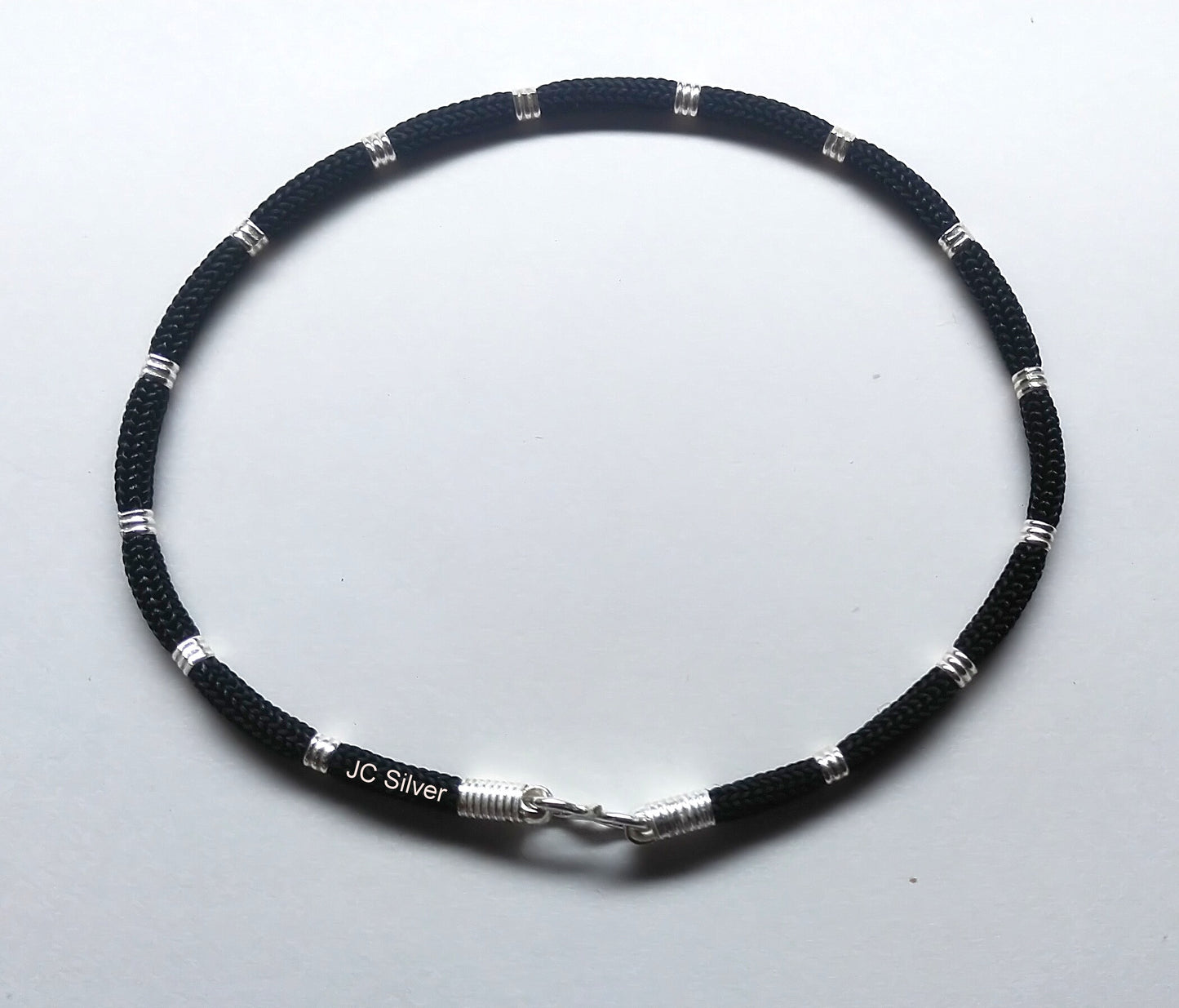 Black thread silver nazariya anklet ( round line thread )